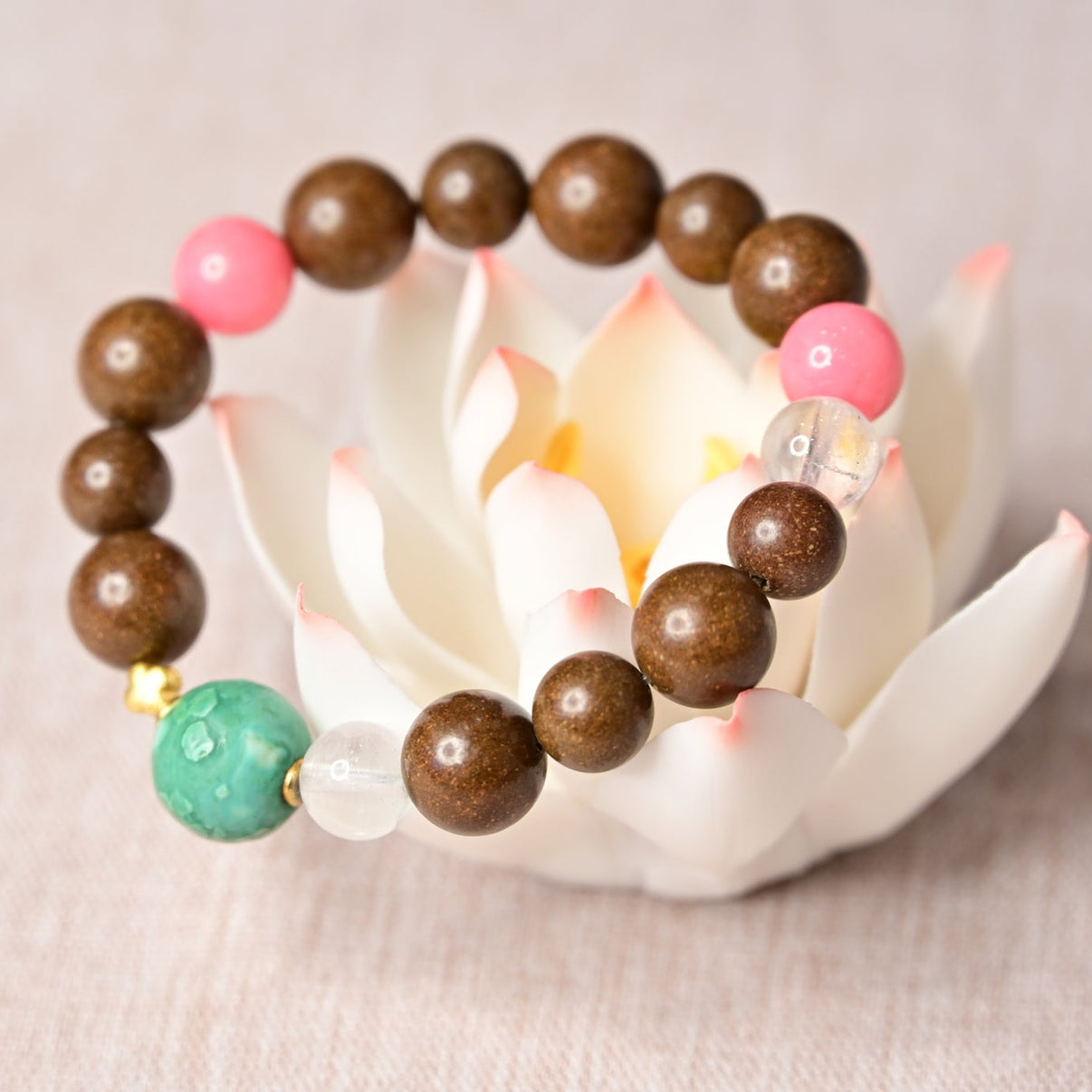 Handmade multi-gemstone bracelet with pink jade, agarwood, and crystal beads. Natural, stylish, and perfect for daily relaxation and mindful living.